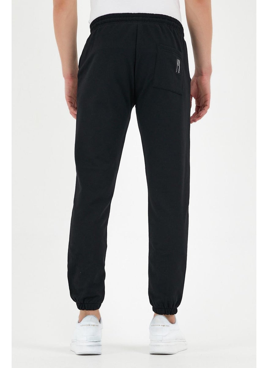 Black Men's Sweatpants with Labeled Back and Side Pockets Regular Fit Elastic Legs.