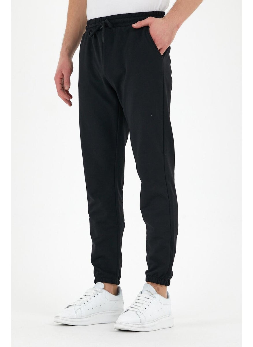 Black Men's Sweatpants with Labeled Back and Side Pockets Regular Fit Elastic Legs.