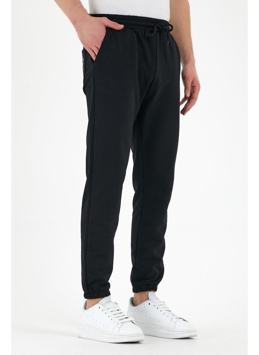 Black Men's Sweatpants with Labeled Back and Side Pockets Regular Fit Elastic Legs.