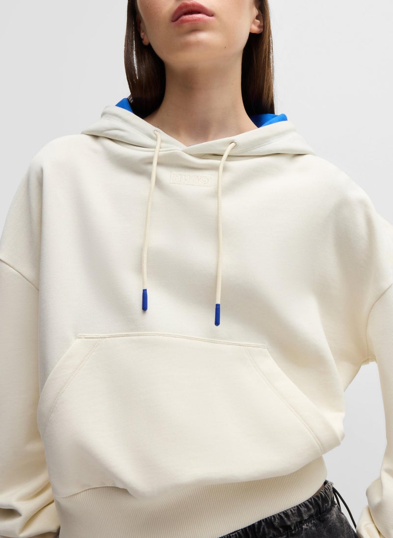 Cropped hoodie in cotton terry with blue-lined hood