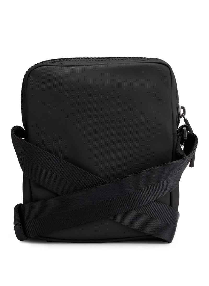 Reporter bag with red logo patch
