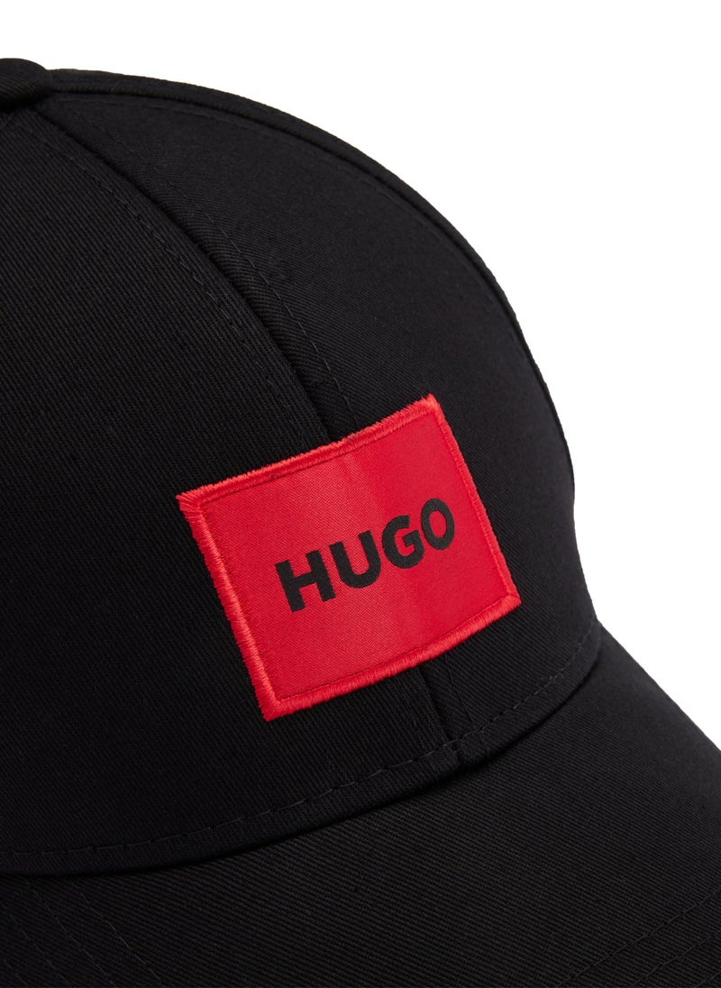 Cotton-twill cap with red logo label