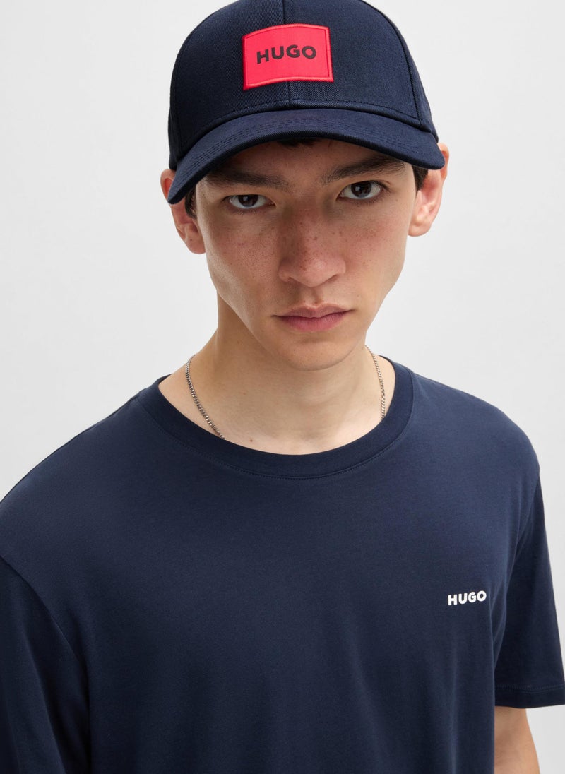 Cotton-twill cap with red logo label