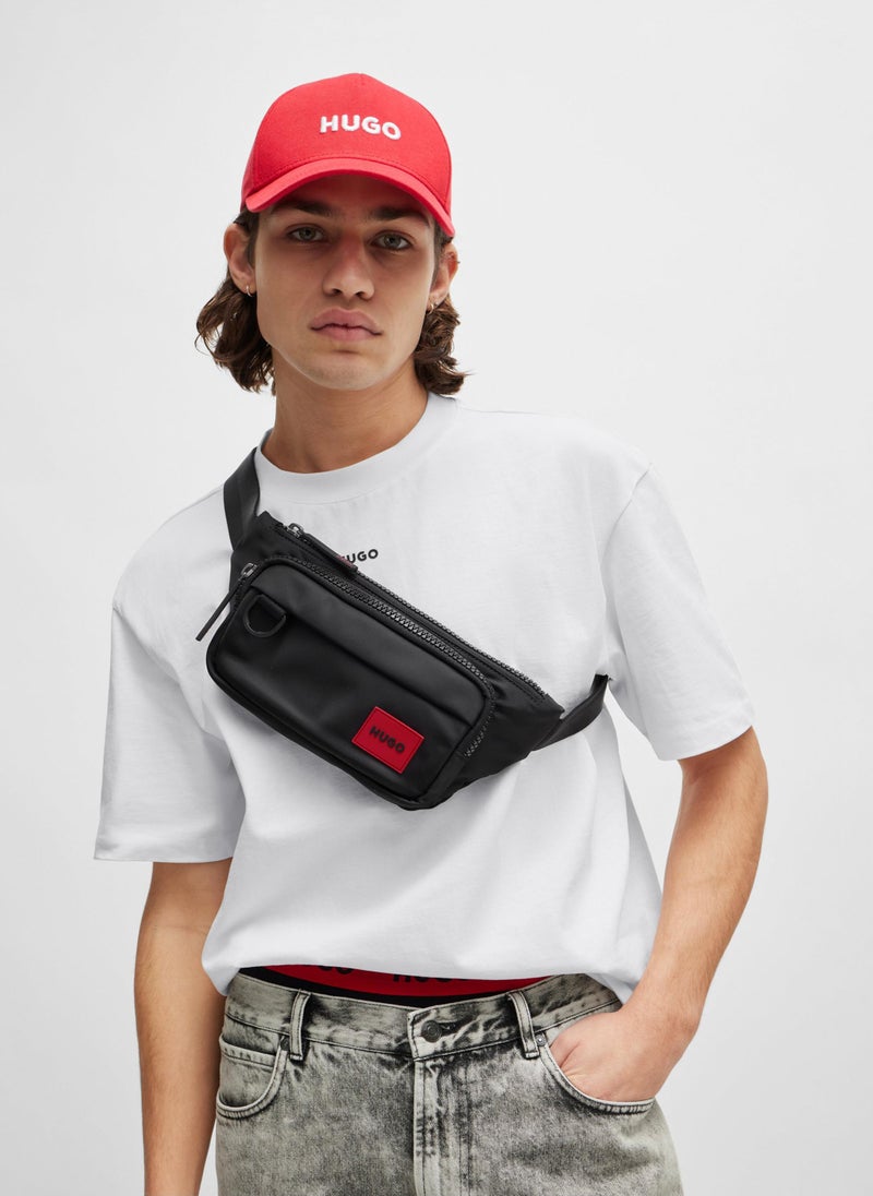 Belt bag with red logo patch