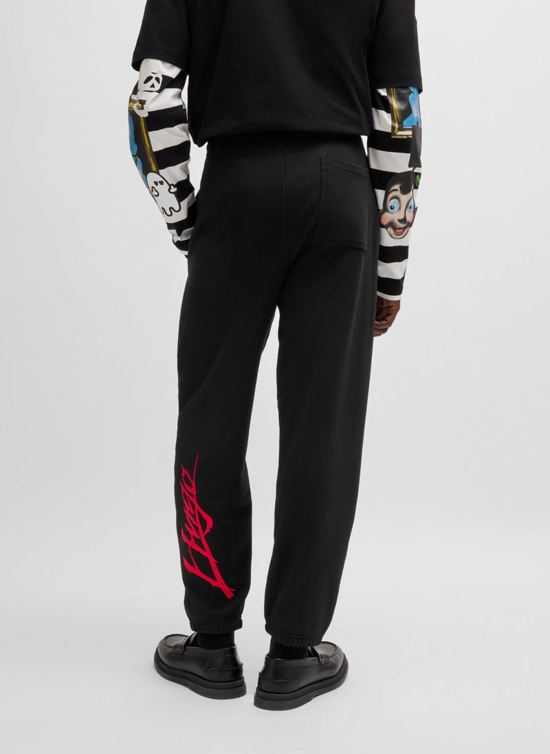 Cotton-terry tracksuit bottoms with double logo