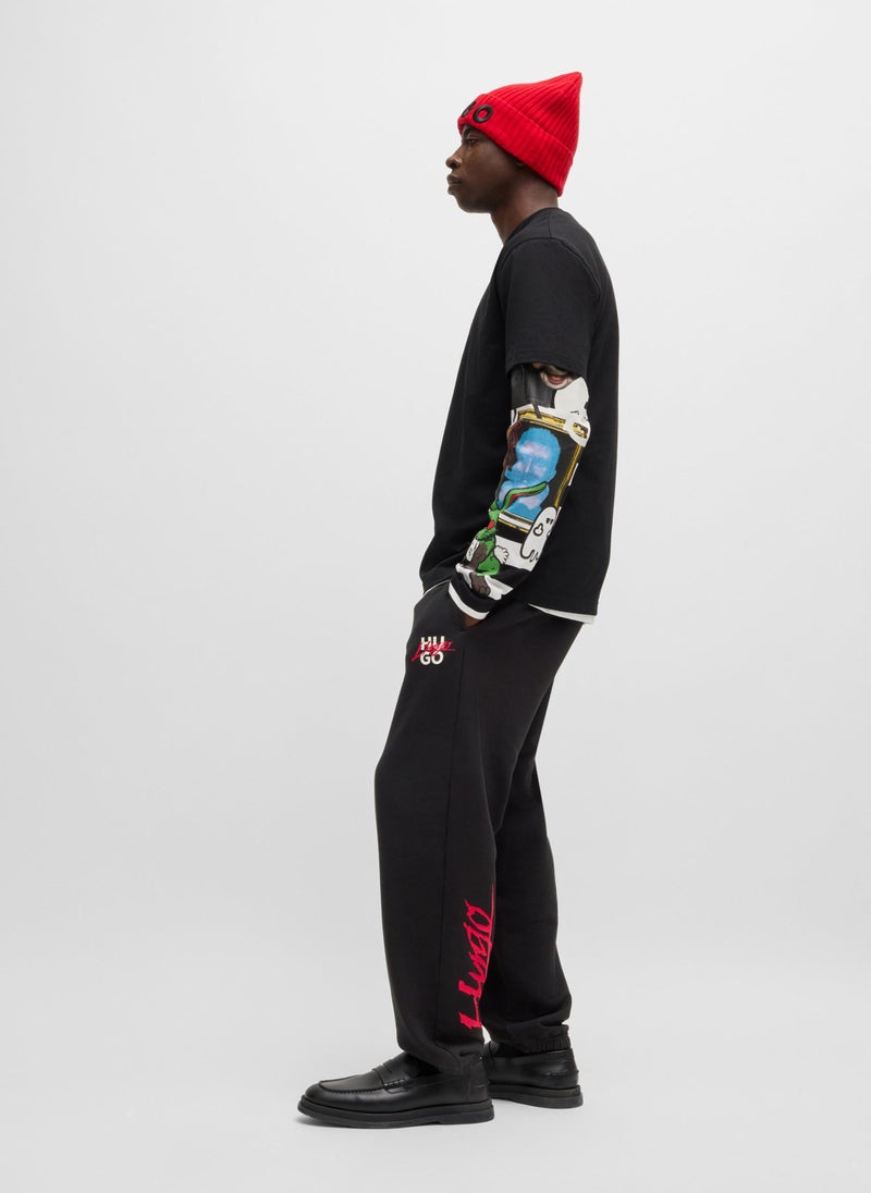 Cotton-terry tracksuit bottoms with double logo