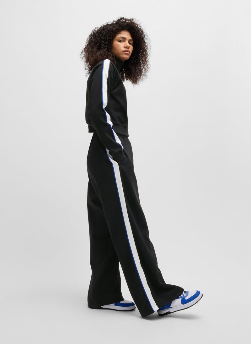 Wide-leg stretch-cotton tracksuit bottoms with logo tape