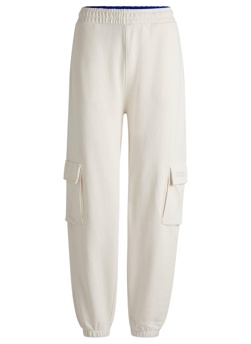 Cargo-style tracksuit bottoms in cotton terry