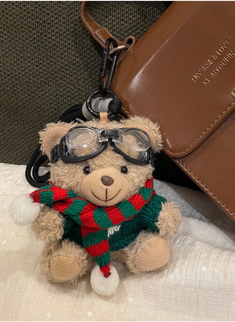 The cute Christmas bear pendant bag charms, wearing a scarf, has a strong Christmas atmosphere and is very suitable as a gift for relatives, lovers, and friends. Suitable for hanging on bags, cars, key chains, etc. There are two styles to choose from.