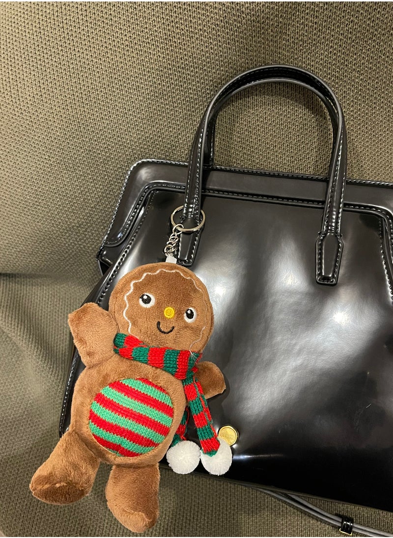 The cute Christmas gingerbread man pendant series bag charms, paired with a scarf or bow tie, creates a strong Christmas atmosphere and is very suitable as a gift for relatives, lovers, and friends. Suitable for hanging on bags, cars, key chains, etc.