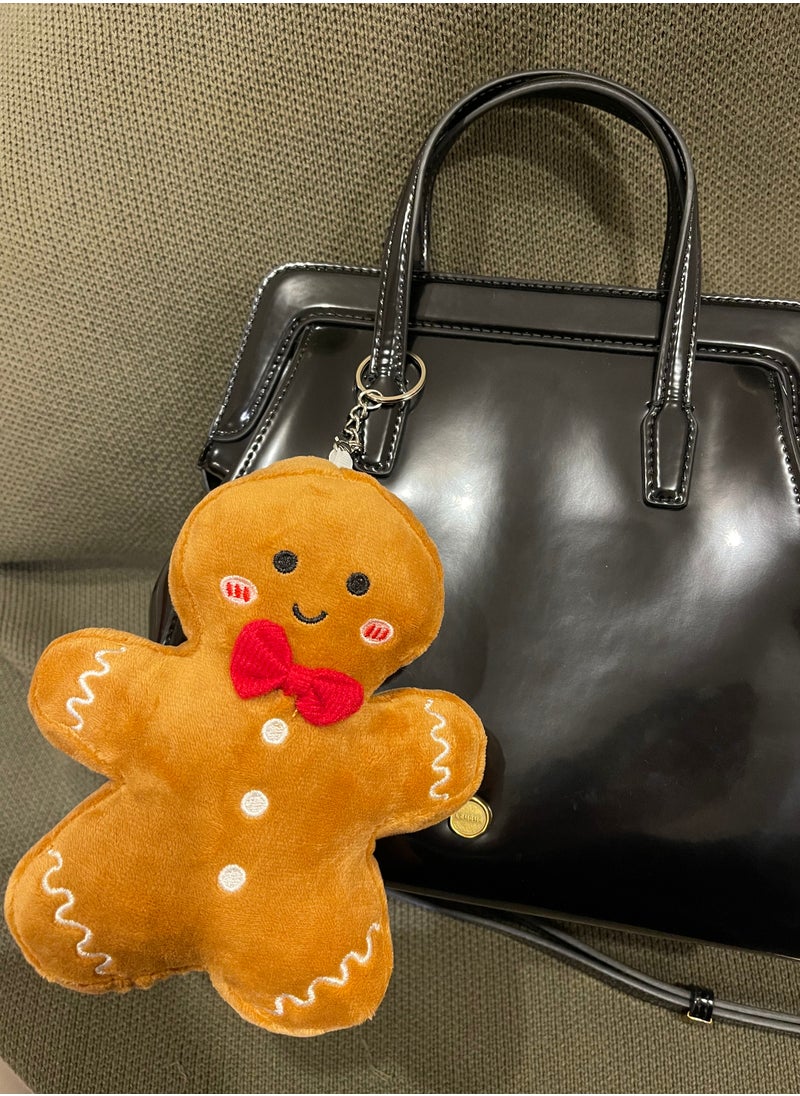 The cute Christmas gingerbread man pendant series bag charms, paired with a scarf or bow tie, creates a strong Christmas atmosphere and is very suitable as a gift for relatives, lovers, and friends. Suitable for hanging on bags, cars, key chains, etc.