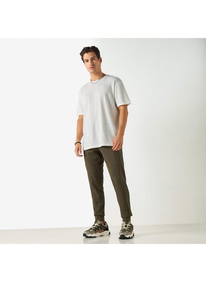 Iconic Solid Slim Fit Joggers with Drawstring Closure and Pockets