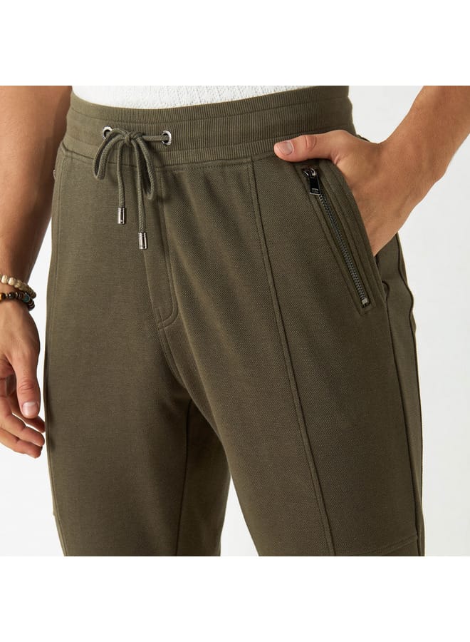 Iconic Solid Slim Fit Joggers with Drawstring Closure and Pockets