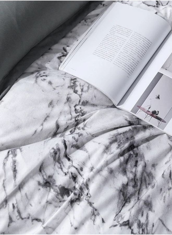 Single-Size 4-Piece Marble Duvet Cover Set. Reversible Bedding Ensemble in Grey and White.