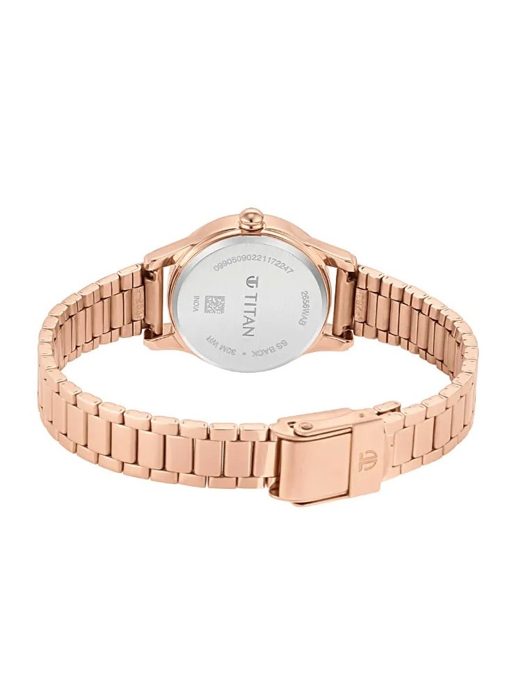 Titan Lagan Quartz Analog with Day and Date Women Watch Silver Dial With Rose Gold Colour Metal Strap