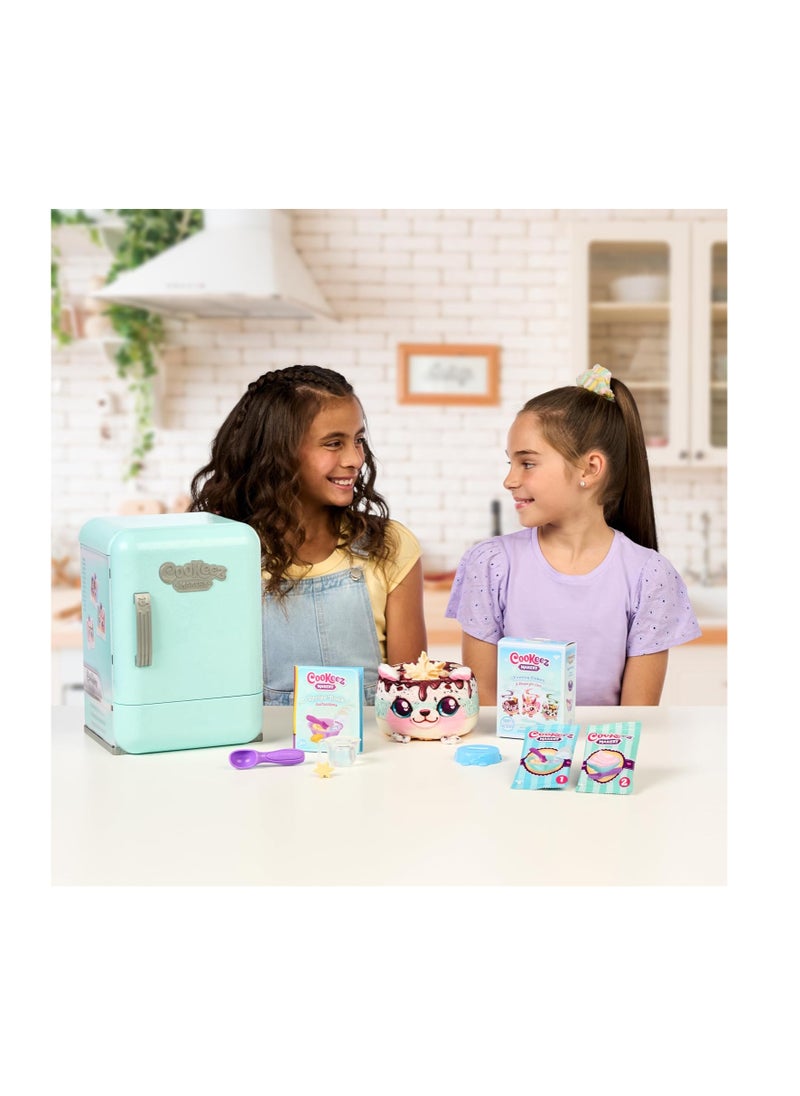 Cookeez Makery Freezy Cakez Fridge, Freezy Cakez. Mix & Decorate Your Plush Best Friend! Place Your Cake Mix in The Freeze and Be Amazed When A Scented, Shivering, Interactive Plush Friend Comes Out,1 Piece Only, Assorted