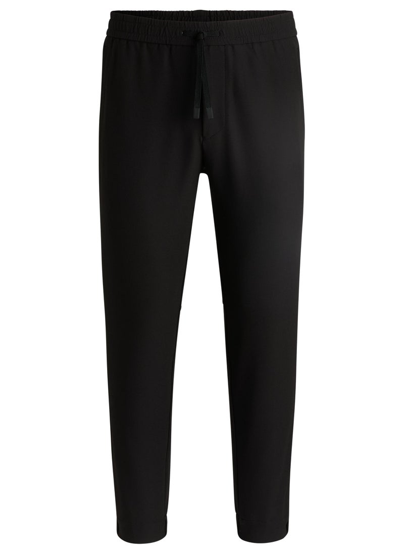Tapered-fit trousers in water-repellent stretch fabric