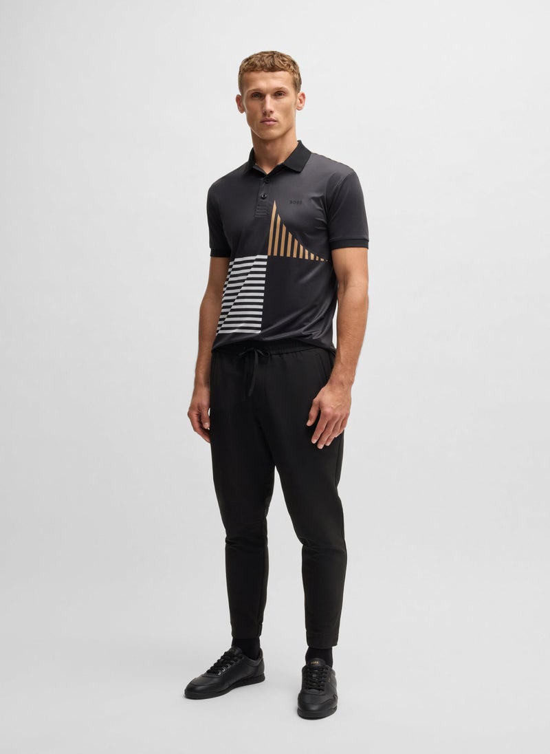 Tapered-fit trousers in water-repellent stretch fabric