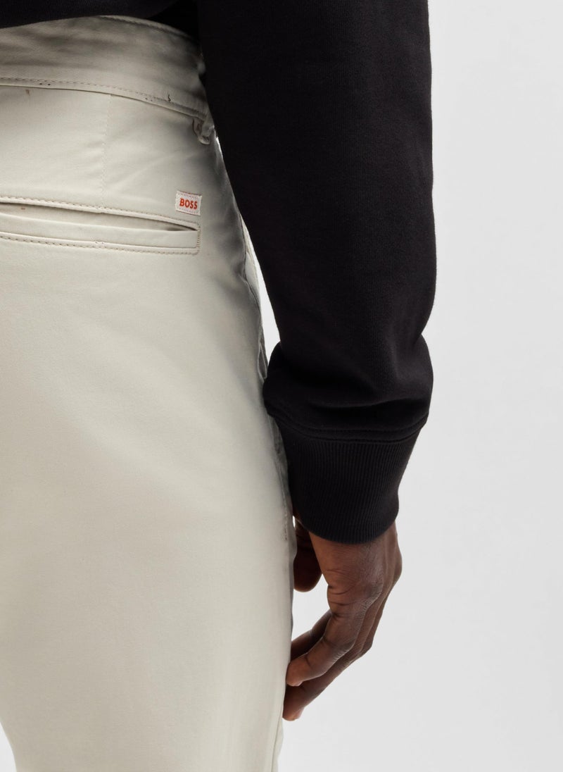Regular-fit chinos in stretch-cotton satin
