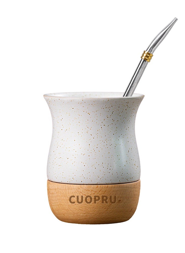 Ceramic cup on wooden base with straw brush, mate tea cup, coffee cup