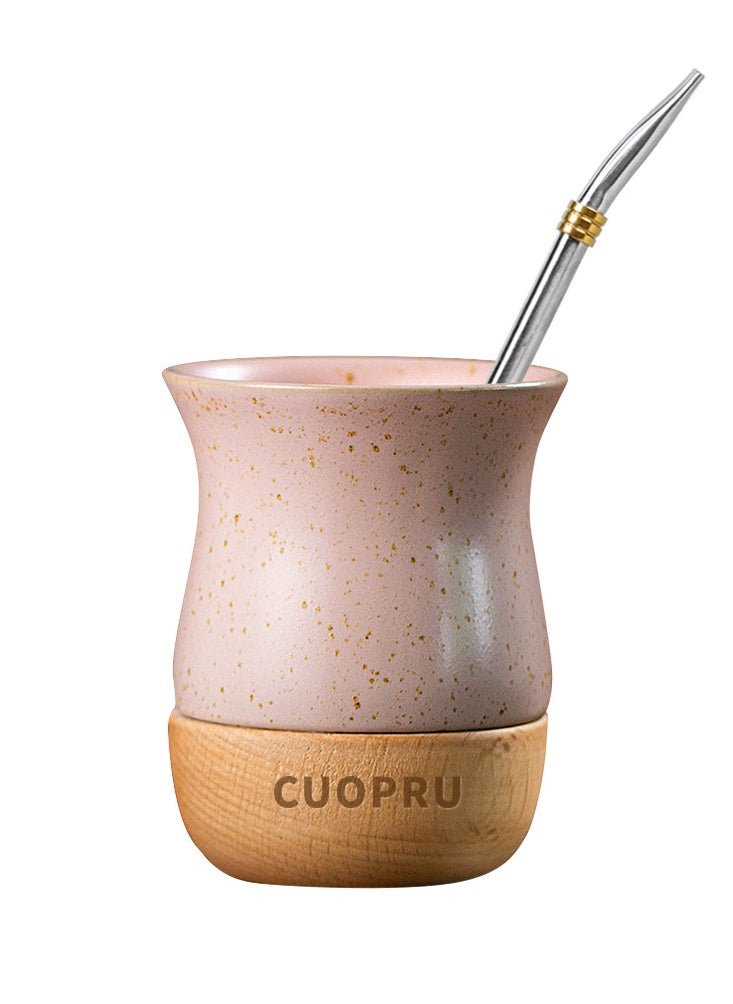 Ceramic cup on wooden base with straw brush, mate tea cup, coffee cup