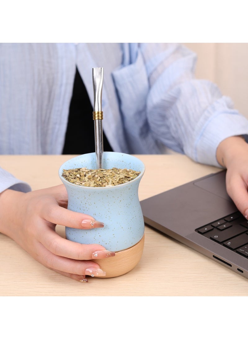 Ceramic cup on wooden base with straw brush, mate tea cup, coffee cup