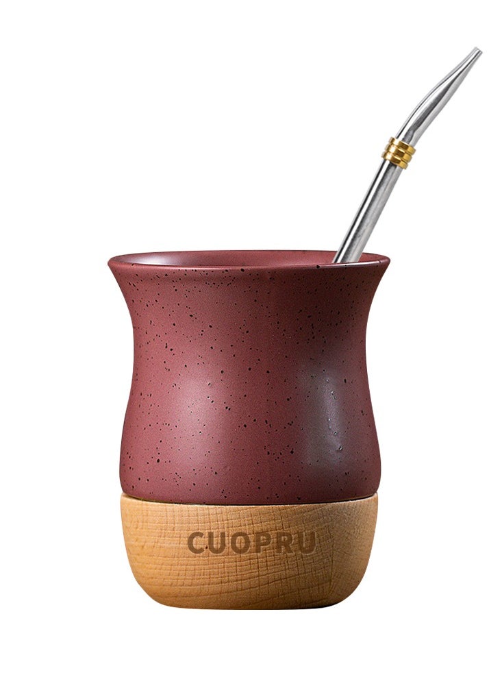 Ceramic cup on wooden base with straw brush, mate tea cup, coffee cup