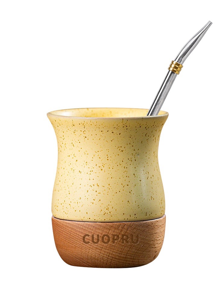 Ceramic cup on wooden base with straw brush, mate tea cup, coffee cup