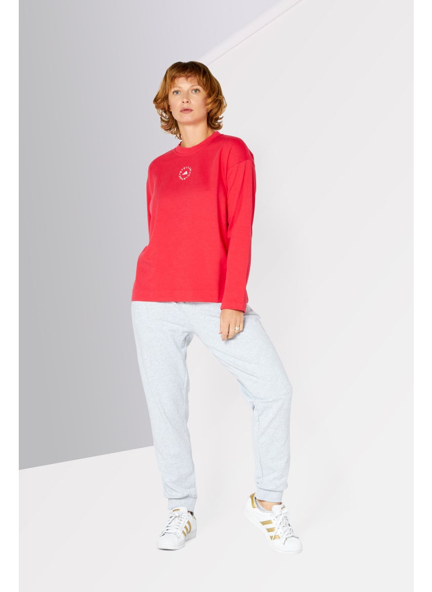 Women Sportswear Fit Long Sleeves Brand Logo Training T-Shirt, Pink