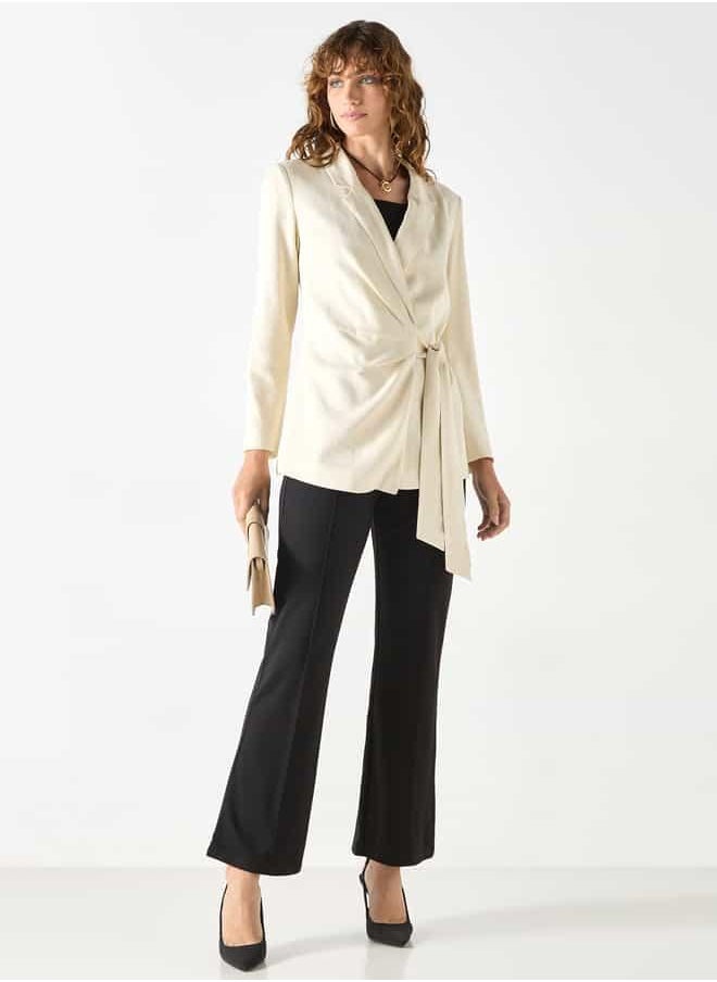 Iconic Textured Wrap Jacket with Notched Lapel and Tie-Up Detail