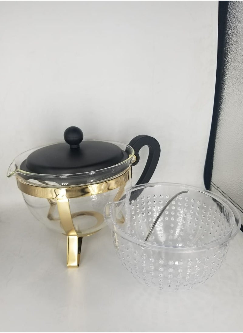 Tea pot with lid , black and gold ,with basket