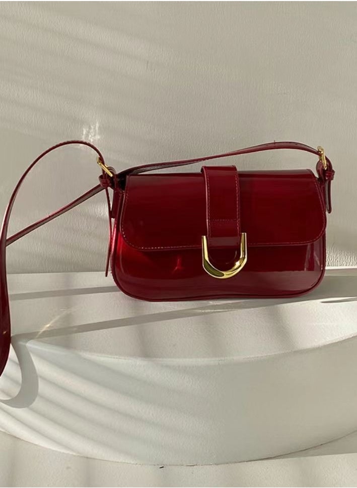 Stylish red patent leather shoulder bag, simple atmospheric design, everything must go together, suitable for everyday and party