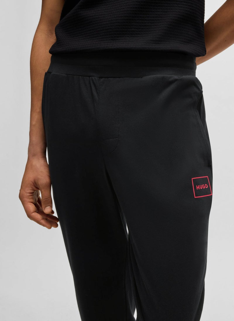 Stretch-cotton tracksuit bottoms with logo print