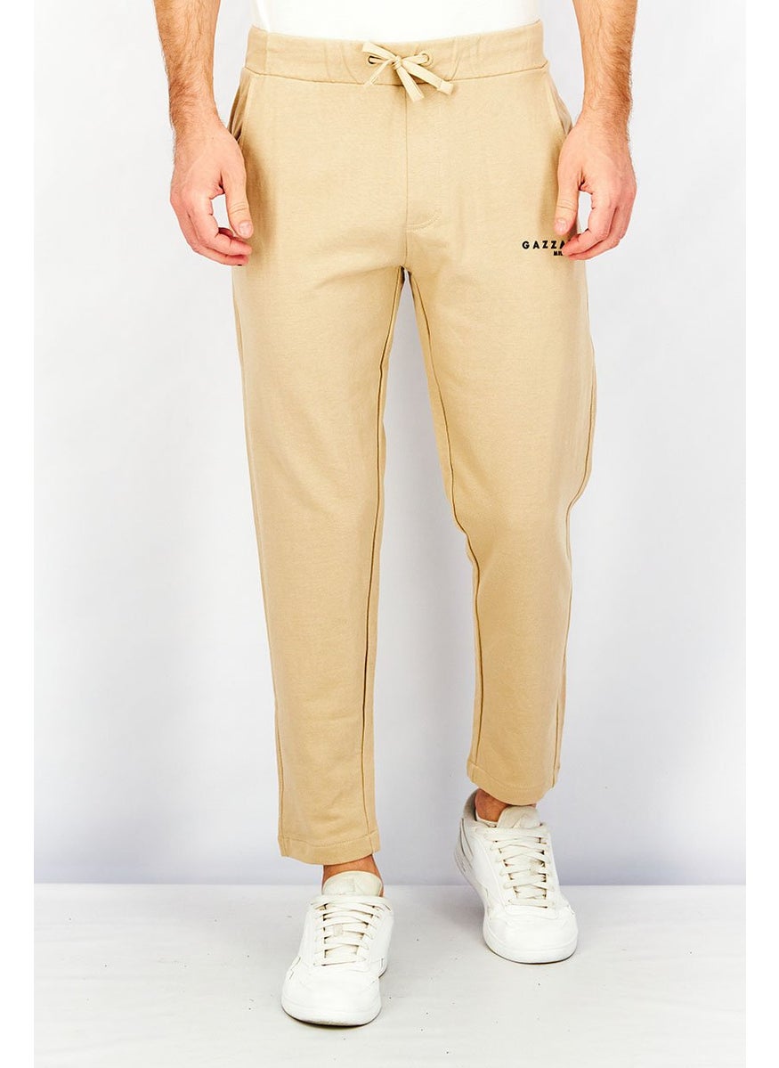 Men Regular Fit Drawstring Printed Pants, Beige