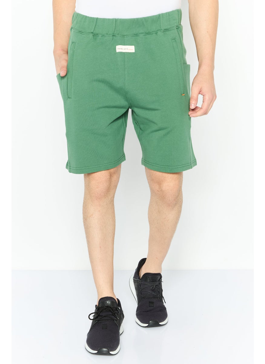Men Sportswear Fit Brand Logo Outdoor Shorts, Green