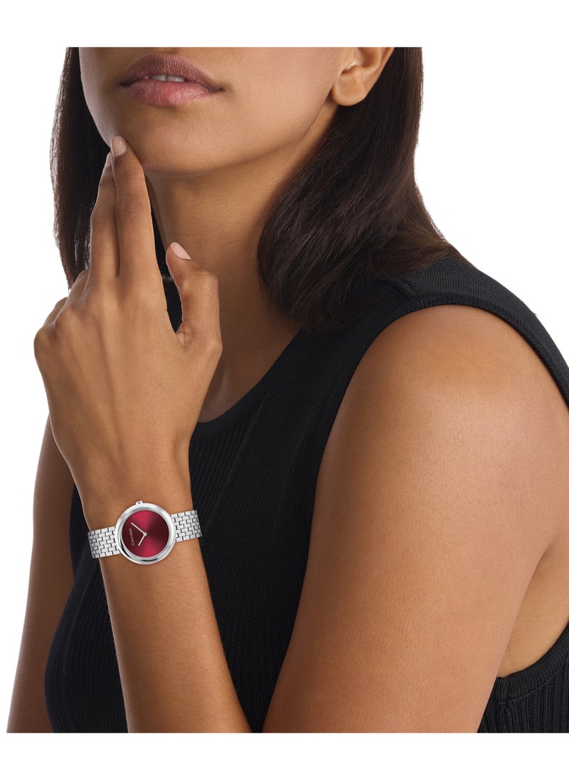 CALVIN KLEIN ROUND ANALOG WOMEN'S RED CASE WATCH - 25100064