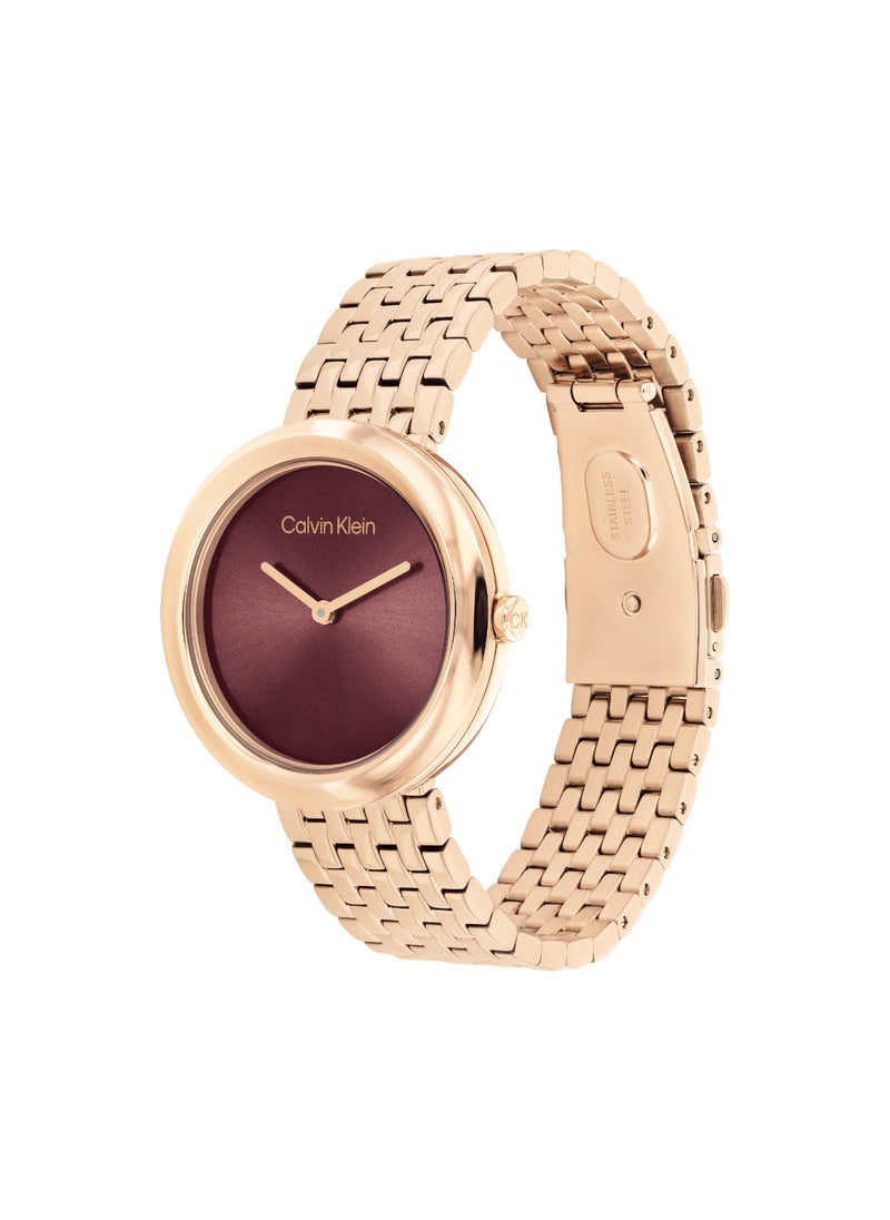 CALVIN KLEIN ROUND ANALOG WOMEN'S MAUVE CASE WATCH - 25100067