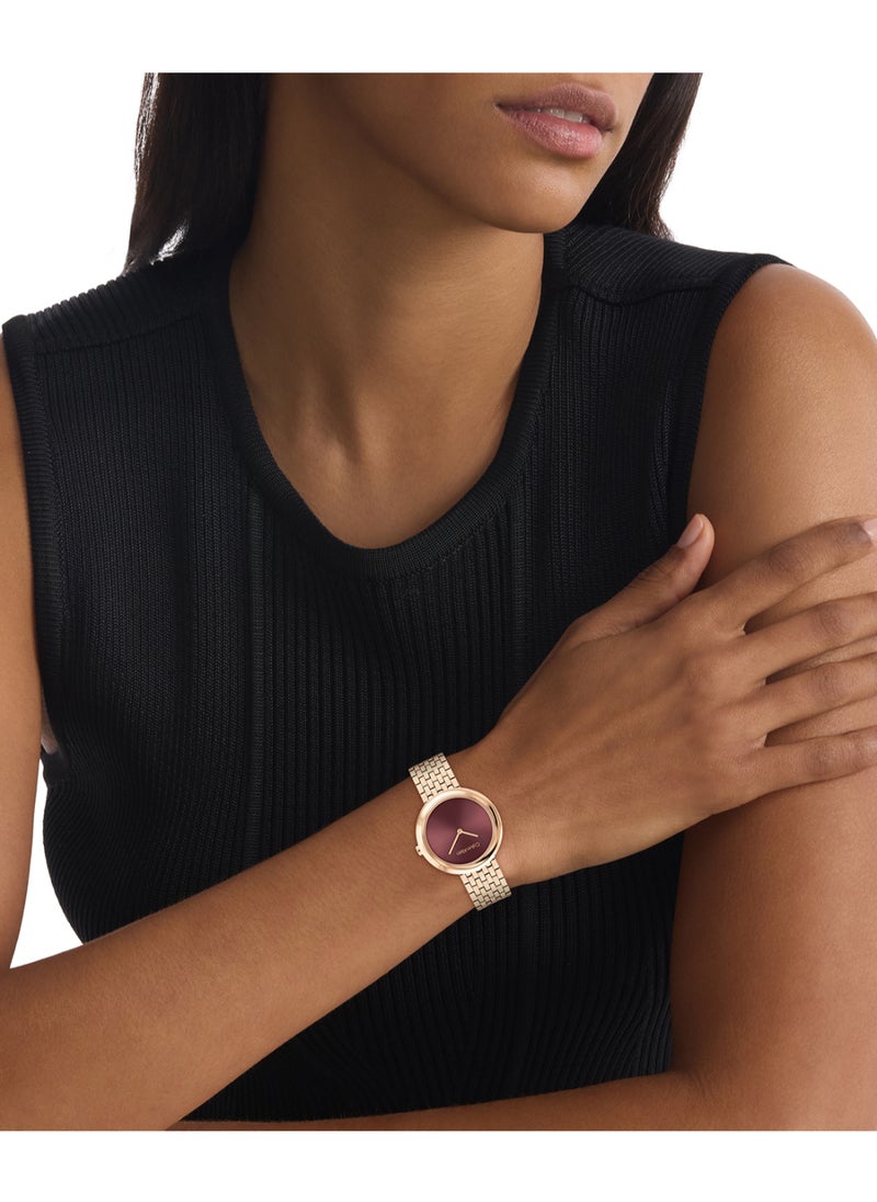 CALVIN KLEIN ROUND ANALOG WOMEN'S MAUVE CASE WATCH - 25100067