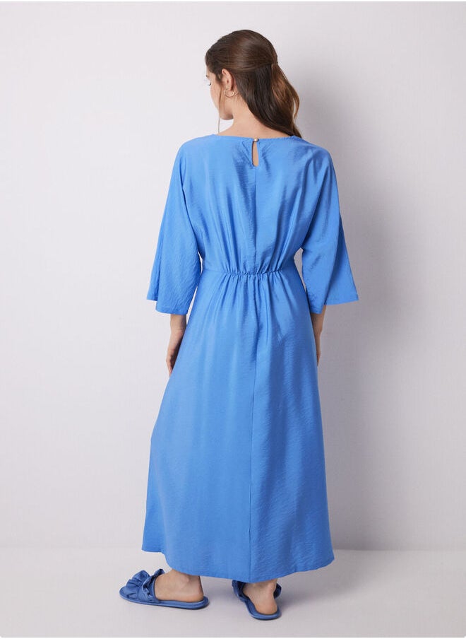 Blue pleated satin caftan dress