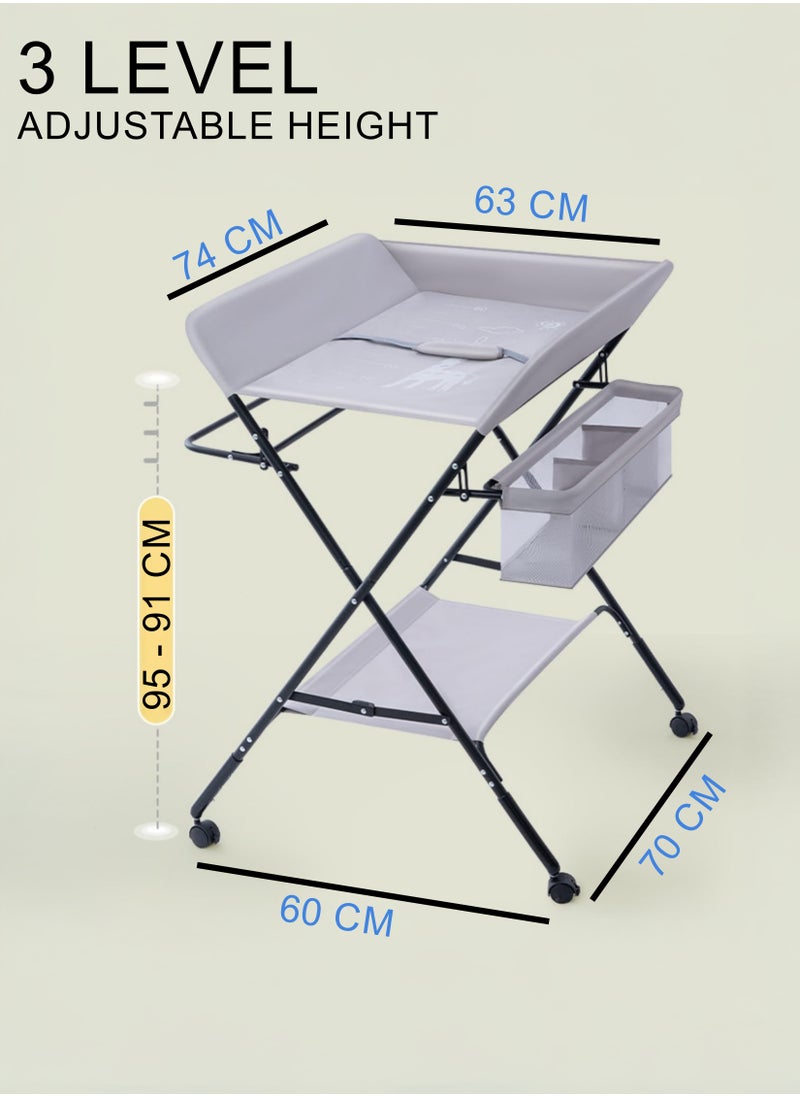 Foldable Baby Changing Table with Wheels, Adjustable Heights, Waterproof Oxford Cloth, Portable Nursery Organizer with Storage Rack – Durable, Space-Saving Diaper Changing Station for Newborns and Infants, Multi-Functional, Sturdy Frame, Adjustable Height, Easy to Clean, Lockable Wheels, Baby Massage Table, Safe & Comfortable Changing Surface