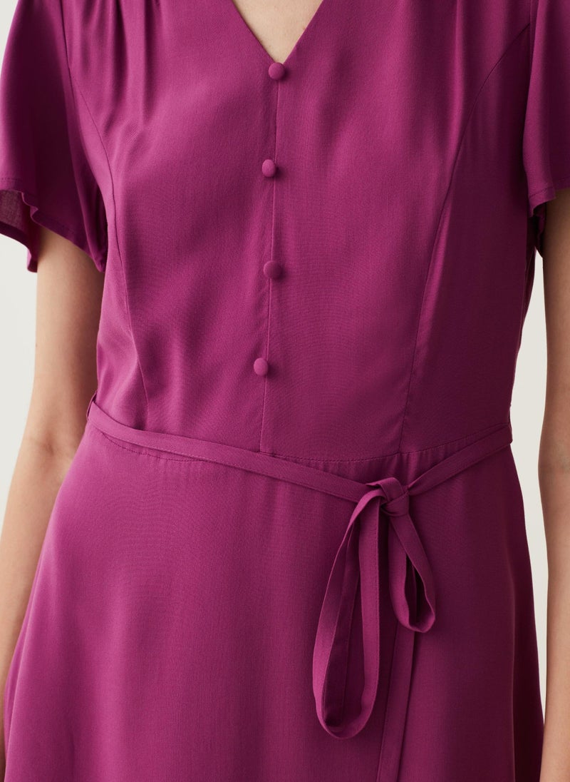 Short dress in viscose with V neck