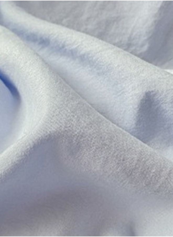 3-Piece Set: queen-size fitted bedsheet and two pillowcases, washable cotton in a light blue color.