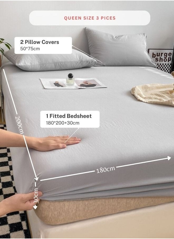 3-Piece Set: queen-size fitted bedsheet and two pillowcases, washable cotton in a light grey color.