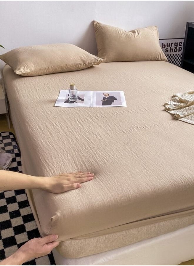 3-Piece Set: queen-size fitted bedsheet and two pillowcases, washable cotton in a beige color.