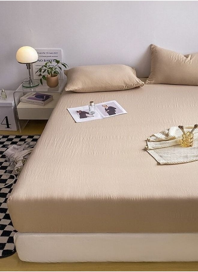 3-Piece Set: queen-size fitted bedsheet and two pillowcases, washable cotton in a beige color.