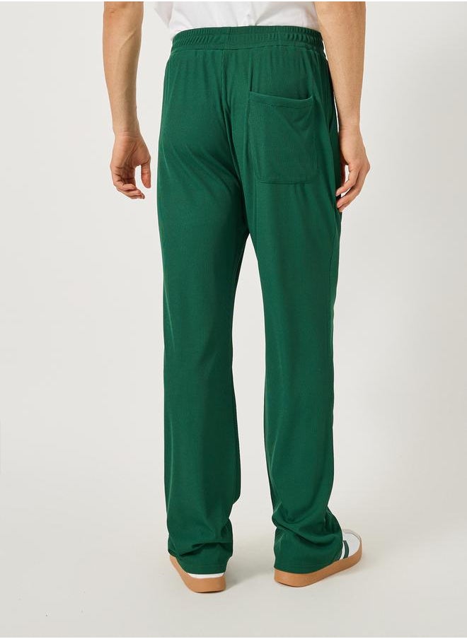 Relaxed Fit Embroidered Joggers with Pintuck Detail