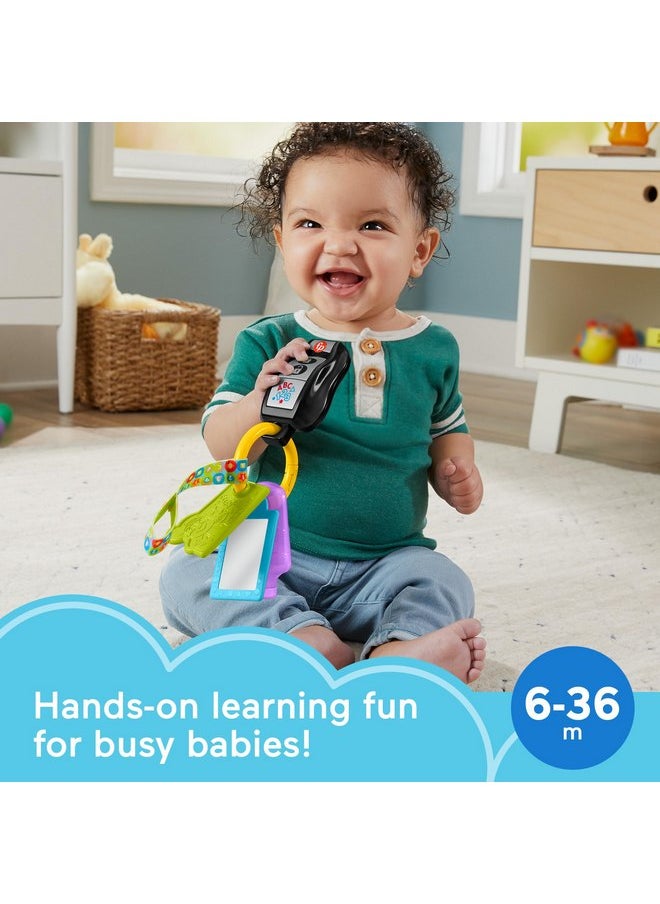 Fisher-Price Baby Travel Toy Laugh & Learn Play & Go Activity Keys with Learning Music, Teether & Mirror for Infants Ages 6+ Months