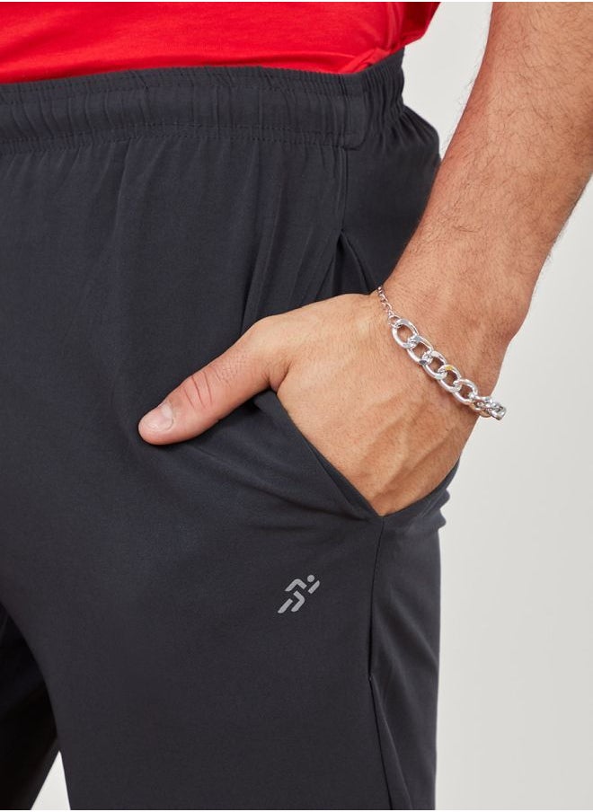 Woven Running Track Pants with Zip Hem