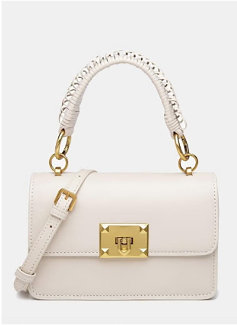 A crossbody tote bag with a flap from Charles & Keith's Compilation collection.