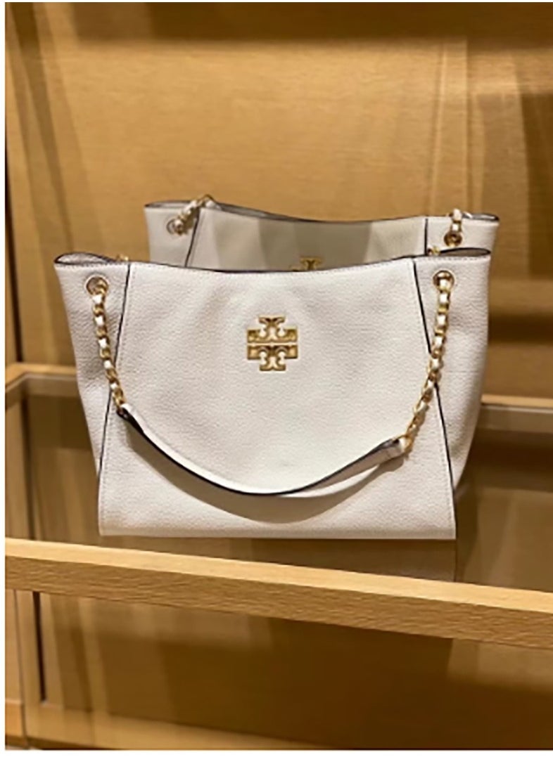 A large - capacity tote from Tory Burch's Britten series, made of cowhide. It features a simple yet fashionable design and can be carried either as a handbag or a shoulder bag, which is great for commuters.